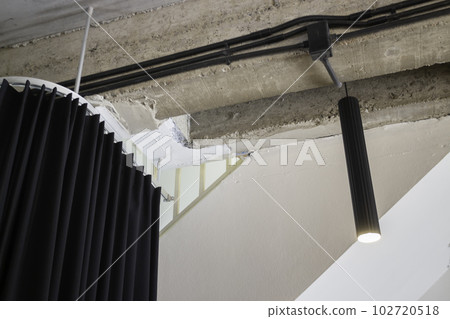 Loft modern black room interior Loft modern black room interior 102720518