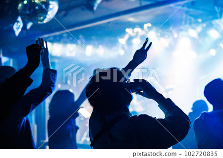 Fans cheering and having fun at a live house 102720835