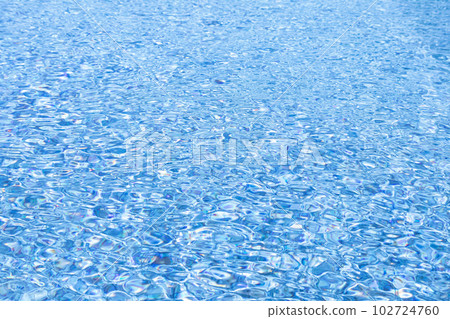 The surface of the water bathed in the sun and swaying in the wind The surface of the water bathed in the sun and swaying in the wind 102724760