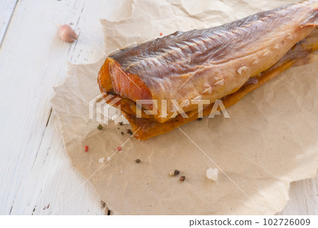 fish balyk on a white wooden background 102726009