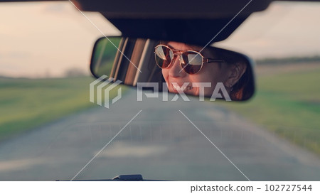 girl mirror interior car. portrait smile mirror. happy dream trip. female happy smile. drive a car road. taxi woman. road steering wheel. eyes mirror reflection. woman's face smile laugh. joy travel girl mirror interior car. portrait smile mirror. happy dream trip. female happy smile. drive a car road. taxi woman. road steering wheel. eyes mirror reflection. woman's face smile laugh. joy travel 102727544