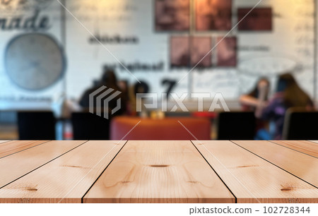 Empty wooden table top with lights bokeh on blur restaurant background. 102728344