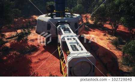 Futuristic complex towering over forest Futuristic complex towering over forest 102729840