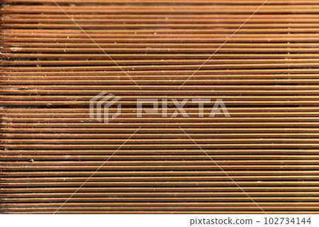 Copper wire background. Thongs made of copper wire. Copper wire background. Thongs made of copper wire. 102734144