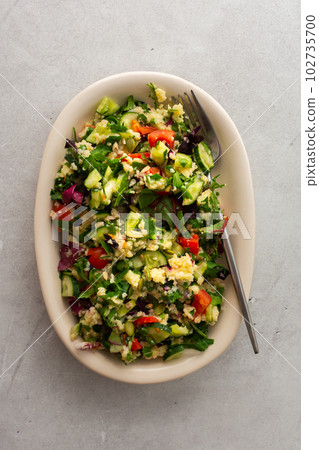Millet porridge with mixed salad Millet porridge with mixed salad 102735700
