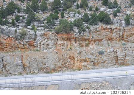 Background and texture of mountain layers, rocks, cracks, sedimentary rocks and forest , Turkey. Background and texture of mountain layers, rocks, cracks, sedimentary rocks and forest , Turkey. 102736234