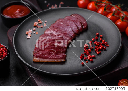 Delicious duck fillet smoked or grilled with spices and salt 102737905