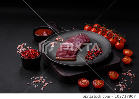 Delicious duck fillet smoked or grilled with spices and salt 102737907