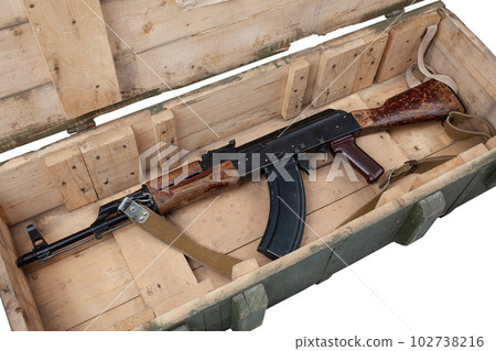 Kalashnikov AK47 gun in army green crate Kalashnikov AK47 gun in army green crate 102738216