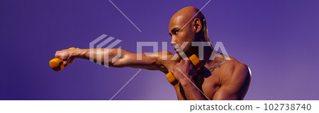 Muscular man doing exercise with weight dumbbells on studio background. Strength and motivation Muscular man doing exercise with weight dumbbells on studio background. Strength and motivation 102738740