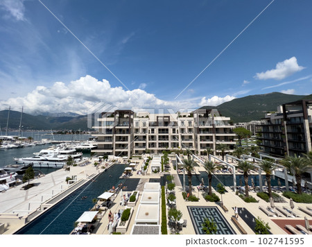 Marina with private beaches and swimming pools near a modern hotel. Porto, Montenegro 102741595