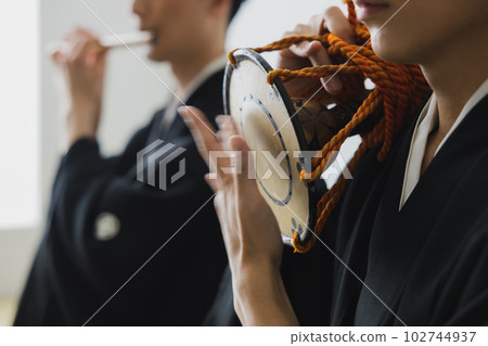 Crested hakama, traditional Japanese musical instrument, hand drum, shinobue Crested hakama, traditional Japanese musical instrument, hand drum, shinobue 102744937