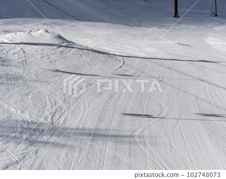The groomed ski slopes 102748073