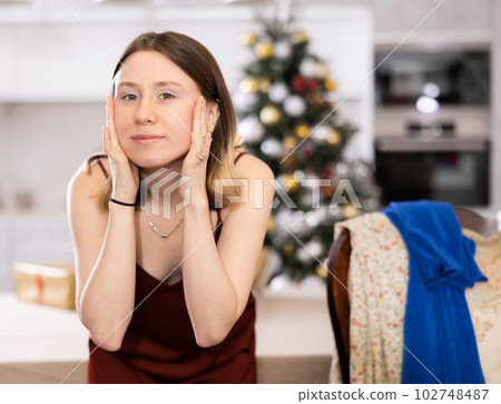 Young woman does a sculptural facial massage Young woman does a sculptural facial massage 102748487