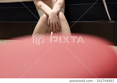 woman sitting in underwear woman sitting in underwear 102748981