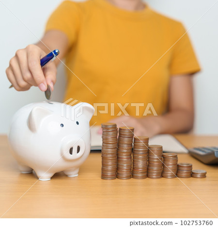 Money Saving for Future Plan, Retirement fund, Pension, Investment, Wealth Business and Financial concepts. hand putting coin into piggy bank, Money Counting and calculate for deposit Money Saving for Future Plan, Retirement fund, Pension, Investment, Wealth Business and Financial concepts. hand putting coin into piggy bank, Money Counting and calculate for deposit 102753760