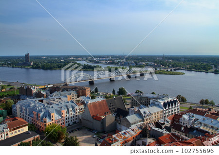 Riga, the capital of Latvia, the northern European Baltic countries. The view from the St. Peter's Church steeple observatory in the historic district of Riga's Old Town, a World Heritage Site. Riga, the capital of Latvia, the northern European Baltic countries. The view from the St. Peter's Church steeple observatory in the historic district of Riga's Old Town, a World Heritage Site. 102755696