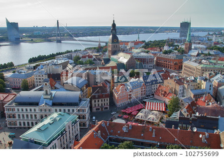 Riga, the capital of Latvia, the northern European Baltic countries. The view from the St. Peter's Church steeple observatory in the historic district of Riga's Old Town, a World Heritage Site. Riga, the capital of Latvia, the northern European Baltic countries. The view from the St. Peter's Church steeple observatory in the historic district of Riga's Old Town, a World Heritage Site. 102755699