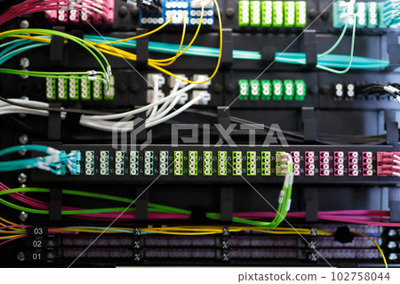 fiber optic patch cords and rack mount patch panel 102758044