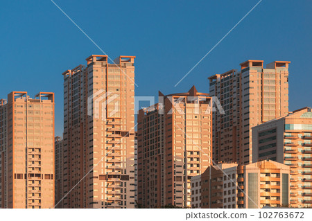 New Residential Multi-storey Houses On Blue Sky. Real Estate, Development Industry. UAE 102763672