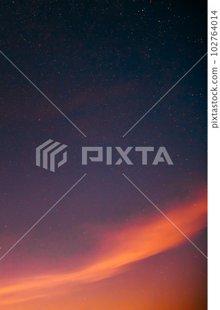 Warm colors background Real sunset Night Sky Stars. Natural Starry Sky Background 102764014
