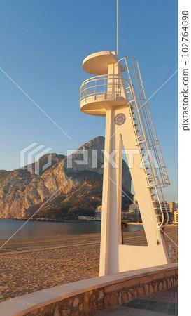 Lifeguard tower on a beach of Calpe. Alicante. Spain. Lifeguard tower on a beach of Calpe. Alicante. Spain. 102764090