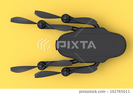 Flying photo and video drone or quad copter isolated on yellow background Flying photo and video drone or quad copter isolated on yellow background 102765011