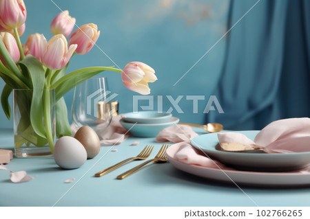 Light blue table decorated with pink tulips and stylish tableware 102766265