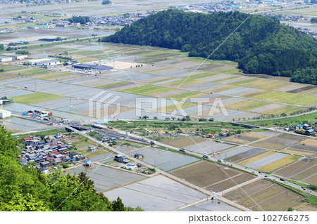 View of Nagahama with paddy fields overlooking Mt. Shizugatake View of Nagahama with paddy fields overlooking Mt. Shizugatake 102766275