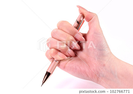 Women's hand with ballpoint pen Women's hand with ballpoint pen 102766771
