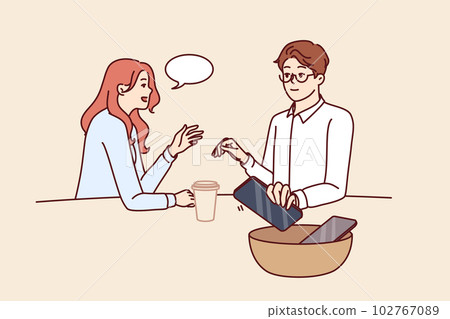Couple have lunch in cafe putting phones to enjoy live communication for concept mobile detox 102767089