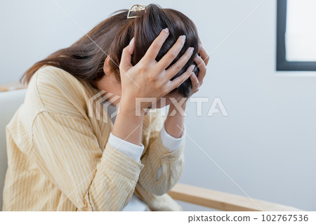 woman hand touching head have headache, young asian female stressed from hard work, 102767536