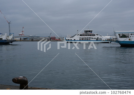 A view of a ferry entering Ujina Port 102768474