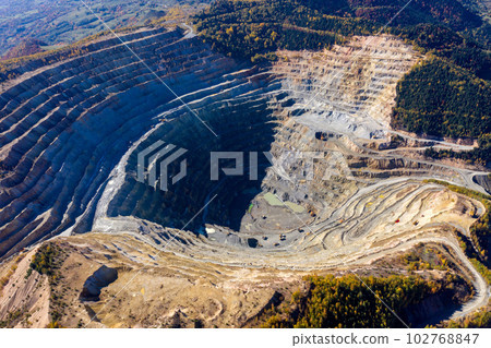 Aerial view of Rosia Poieni open pit copper mine, Romania Aerial view of Rosia Poieni open pit copper mine, Romania 102768847