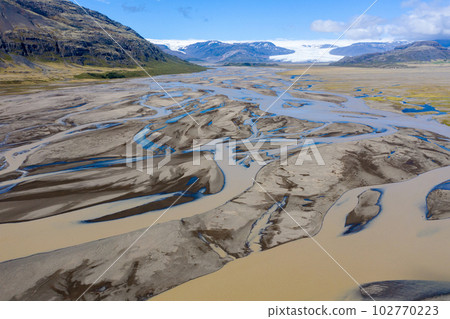Aerial view of a riverbed and water streams in Iceland 102770223
