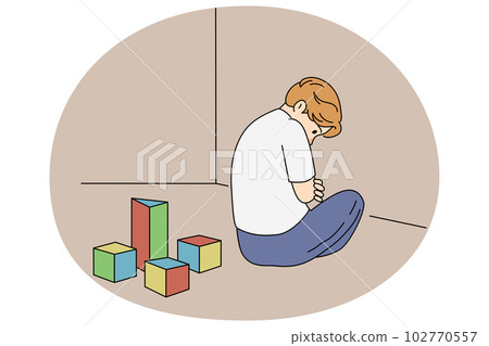 Unhappy boy with autism play alone 102770557