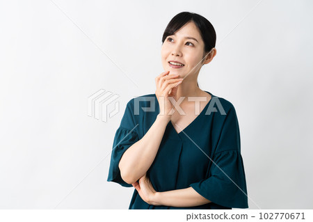 Thinking young woman business image 102770671