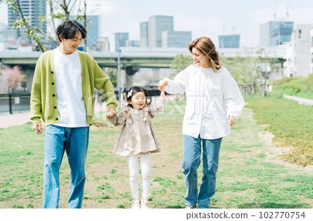 Families walking hand in hand 102770754
