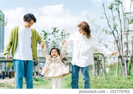 Families walking hand in hand 102770762