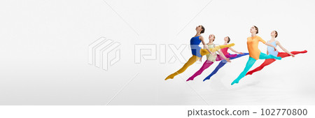 Young girls, beautiful ballet dancers performing, dancing against grey studio background Young girls, beautiful ballet dancers performing, dancing against grey studio background 102770800