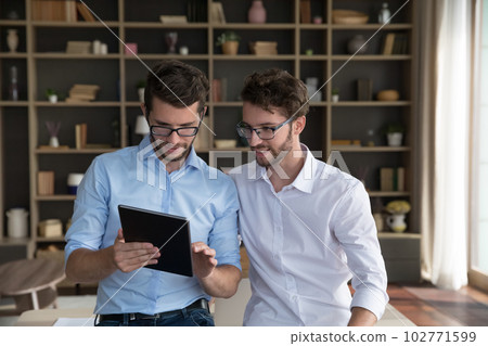 Positive successful family business startup owners talking 102771599