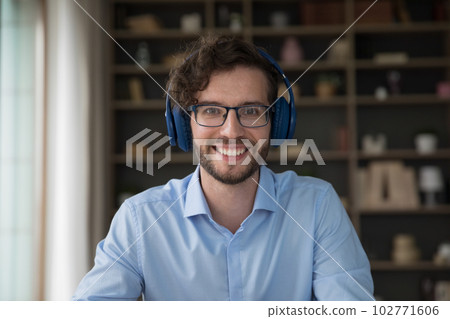 Happy young business professional man in stylish eyeglasses 102771606