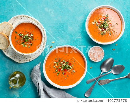 Gaspacho soup on blue, top view 102773778