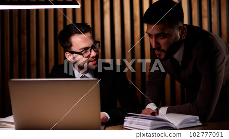 Young business male meeting with a colleague in office at work Young business male meeting with a colleague in office at work 102777091