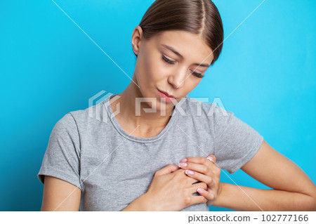 Heart Pain, Beautiful Woman Suffering From Pain In Chest. 102777166