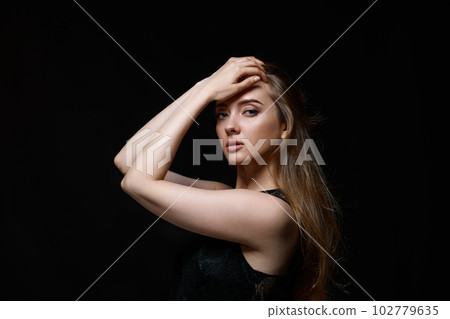 gorgeous brunette woman with long hair in black dress gorgeous brunette woman with long hair in black dress 102779635
