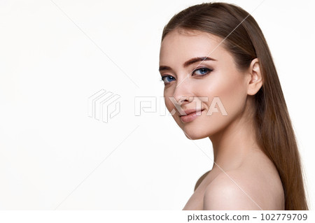 young woman with perfect skin on white background. 102779709