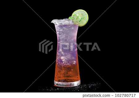 Red Lime Soda on black background,  selective focus, soft focus. 102780717