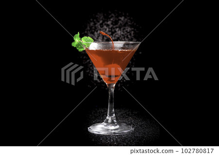 Red cocktail and mint on black background 102780817