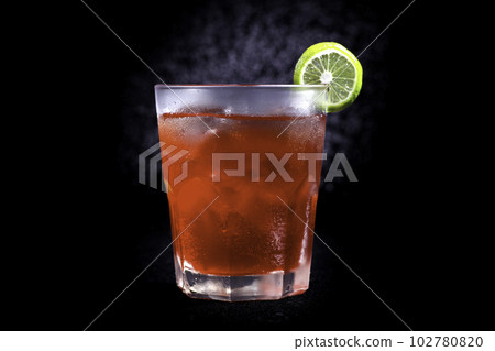 Cape Cod Cocktail on black background,  selective focus, soft focus. 102780820